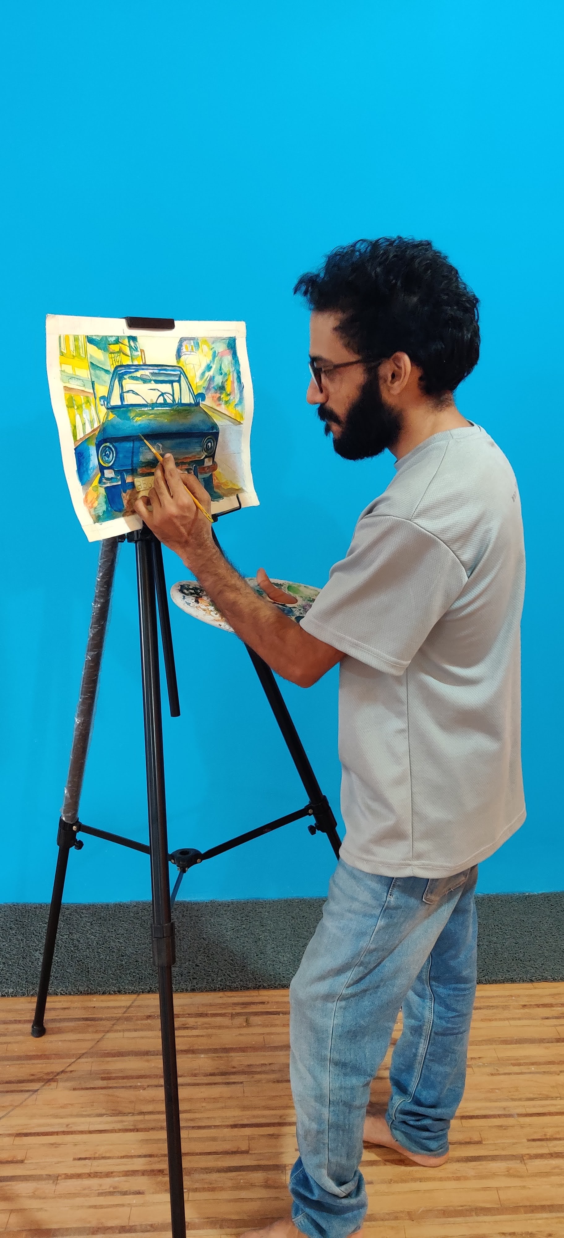 Adult learner working on acrylic painting at RART WORKS Bangalore